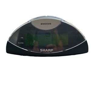 Sharp digital plug in or battery operated snooze black and silver alarm clock